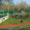 People having fun and enjoying activity in public park